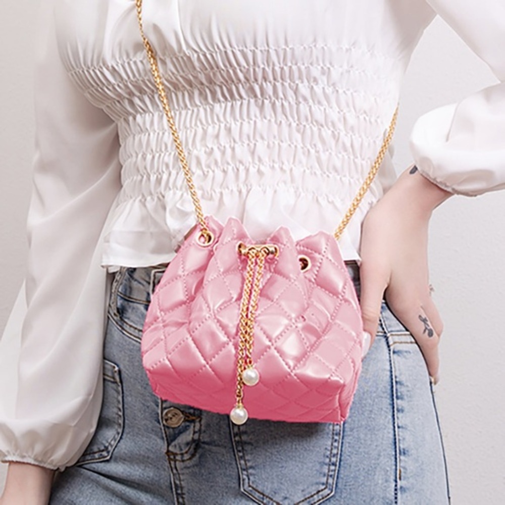 Pink quilted bucket bag
